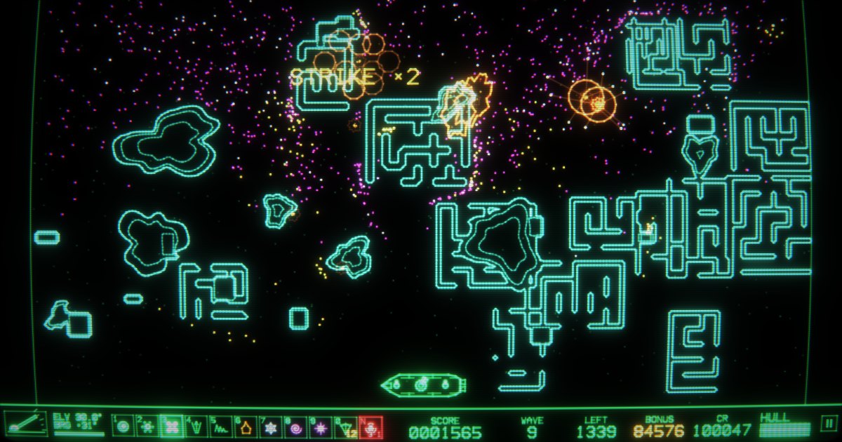 PACBOND V gameplay: a swarm of magenta and yellow dots crossing a battlefield of glowing cyan hills and mazes, with shells bursting and a STRIKE ×2 multi-kill callout